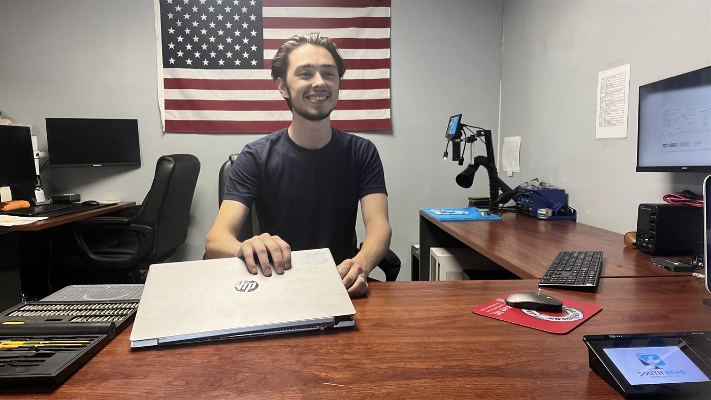 Bryton, owner of South Bend Computer Repair, at the repair bench
